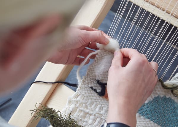 Get creative with a weaving project. Once you’ve started your weaving you can also incorporate different materials and fabrics using the same technique.
