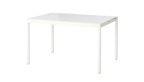 GLIVARP white frosted extendable dining table.