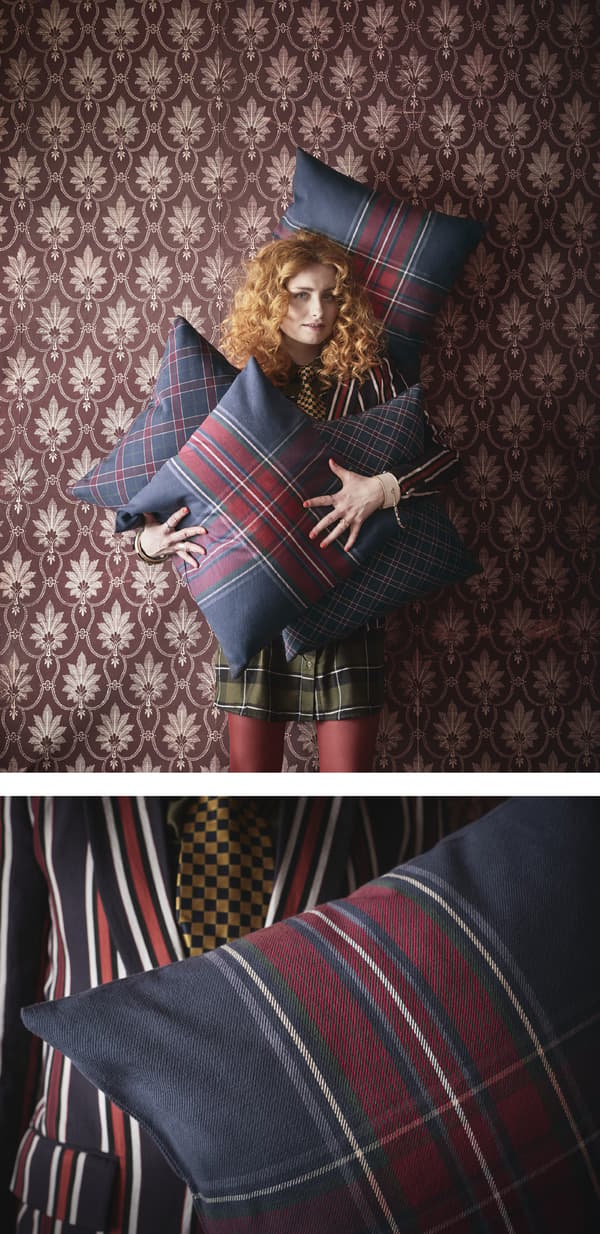 Gros plan d’un coussin orné d’un motif tartan.