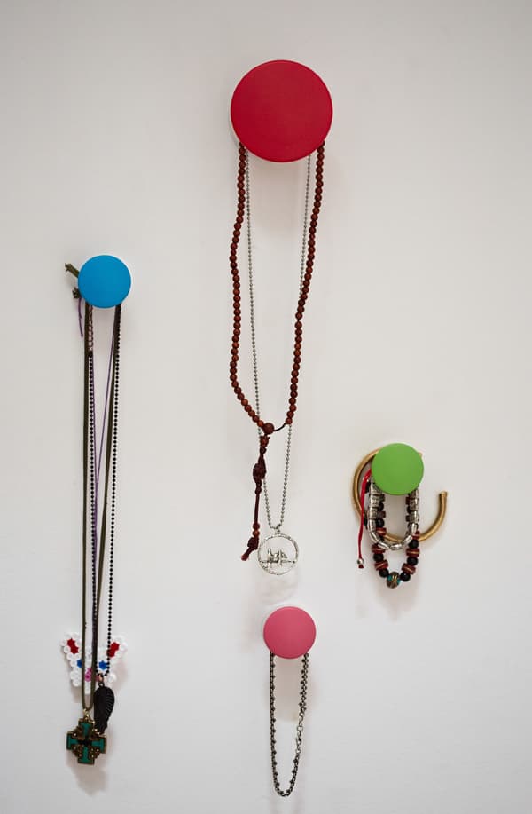 Hang hooks to display jewellery.