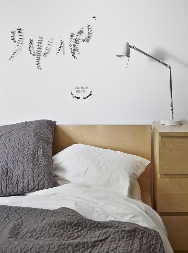 Hang scented stems over the bed.
