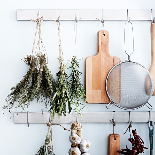 Herbs can be kept longer (while keeping their flavour) by drying them out. Just hang them in bundles upside down somewhere warm and dry.