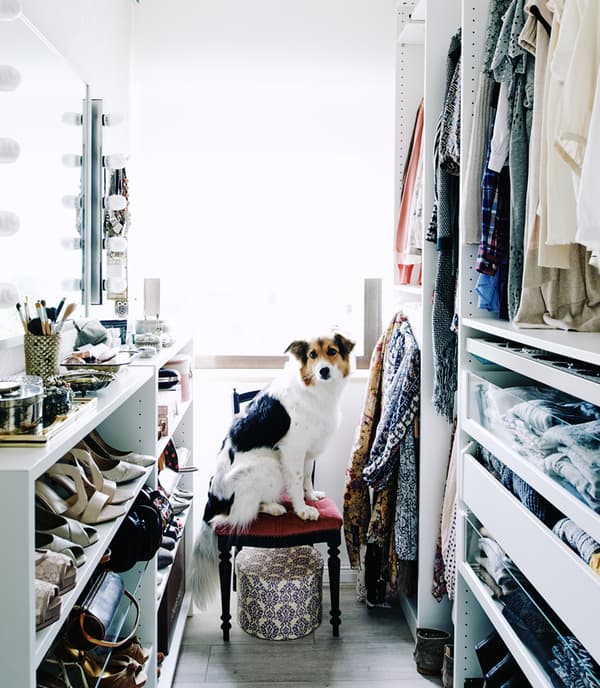 Home owner Mona’s walk-in wardrobe. BILLY shelves and Pax wardrobes keep space open.
