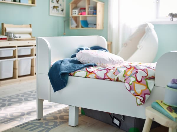 IKEA BUSUNGE white bed with extendable bedframe.
