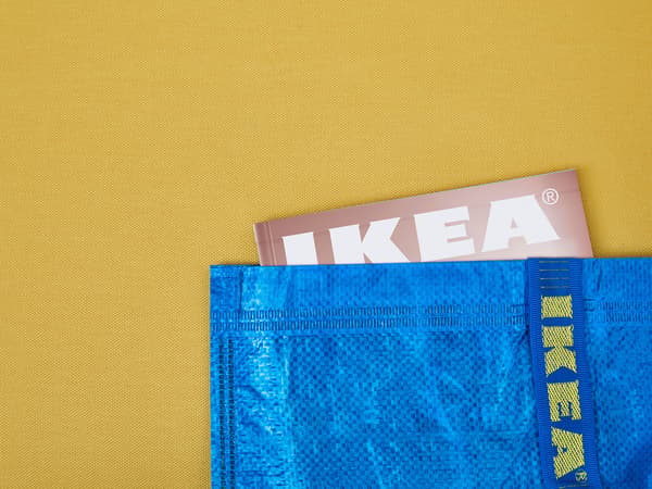 IKEA catalog in a FRAKTA bag.