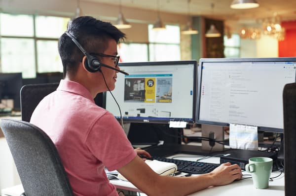 IKEA contact centre coworker is attending to the customer.