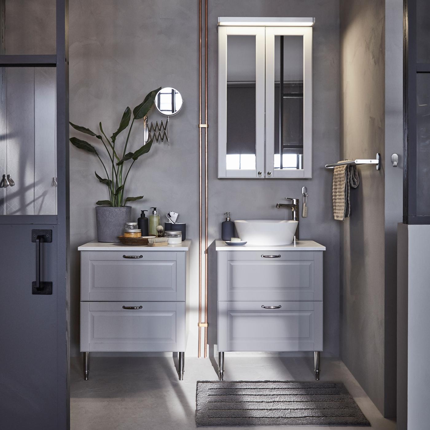 IKEA GODMORGON light grey bathroom wash cabinets and drawers are made from solid wood, while the smooth melamine countertop hides fingerprints and splash marks.