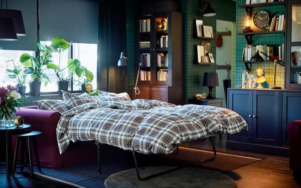 IKEA GRÖNLID red 2-seater sofa bed and armchair with long chaise in a dark green wallpaper living room