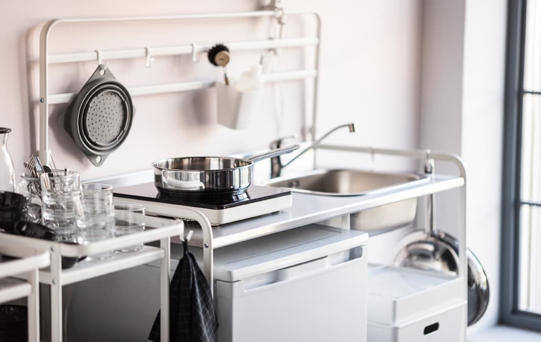 IKEA has a wide range of budget-friendly kitchen furniture. SUNNERSTA mini-kitchen in white is a compact unit and a great solution if you are looking for a fully-functional kitchen. It’s airy, spacious, and easy to put up and take down yourself.