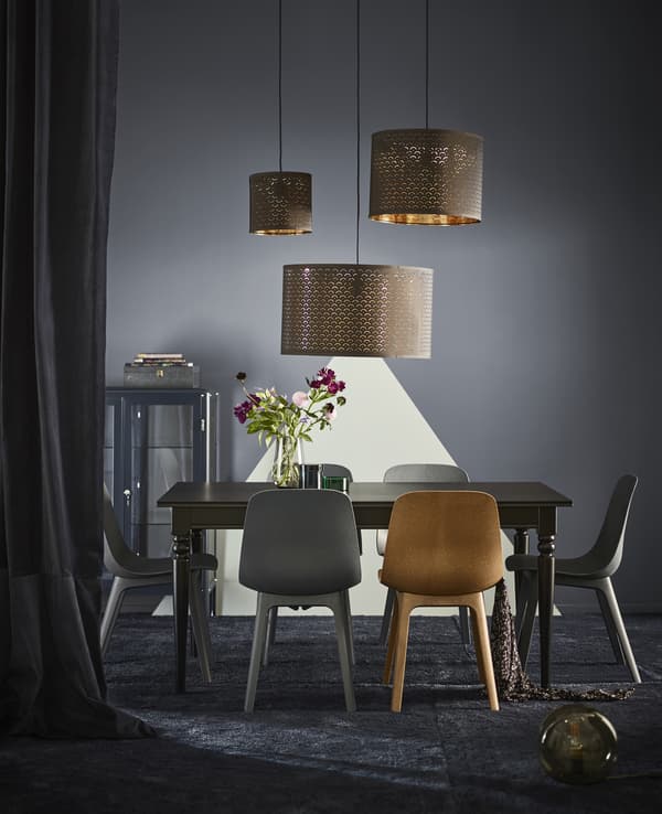 IKEA has blue dining room furniture like modern ODGER chair that clicks together. It has a bowl-shaped seat and a rounded back that are made of renewable wood and recycled plastic.