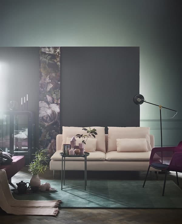 IKEA has furniture for a grey and green living room like a green rug and tray table against a grey wall. Keep the room from being too dark with softer contrasts like a SÖDERHAMN three-seat section sofa in light pink microfibre.