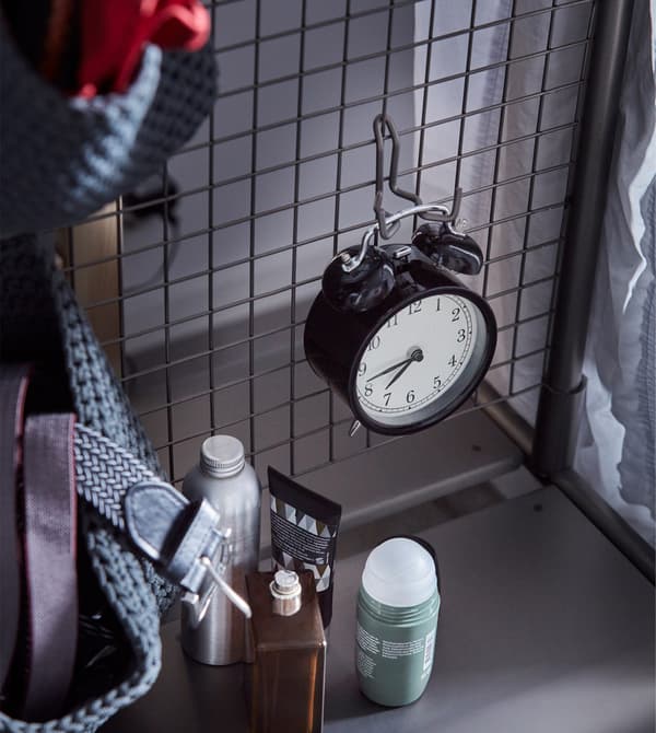 IKEA has lots of dorm decor and necessities like DEKAD alarm clock in black steel. It’s battery-operated with an old-school look and is small enough to fit almost anywhere. We even hung it on the hook of a mesh steel room divider. 