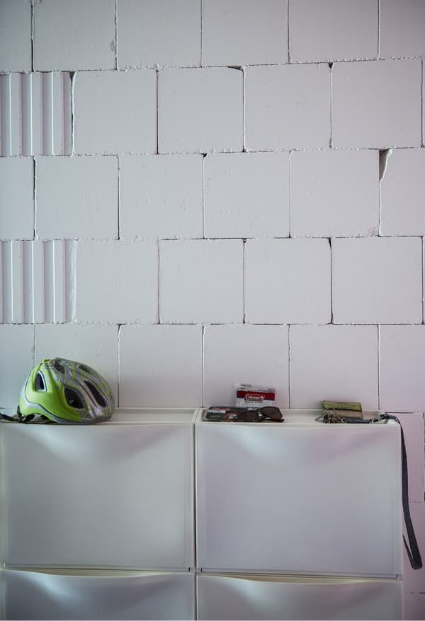 IKEA shoe cabinets on a white wall.