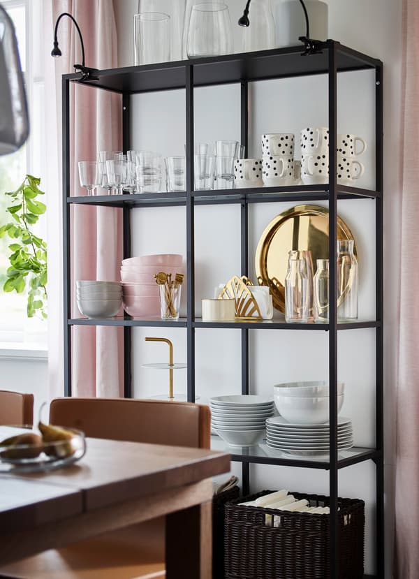 IKEA VITTSJÖ black and brown open storage display unit.