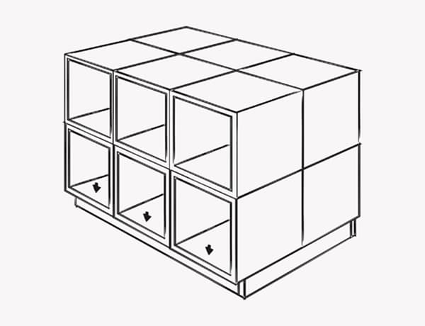 Illustration de la manière de visser la base de l’îlot de cuisine sur le caisson.