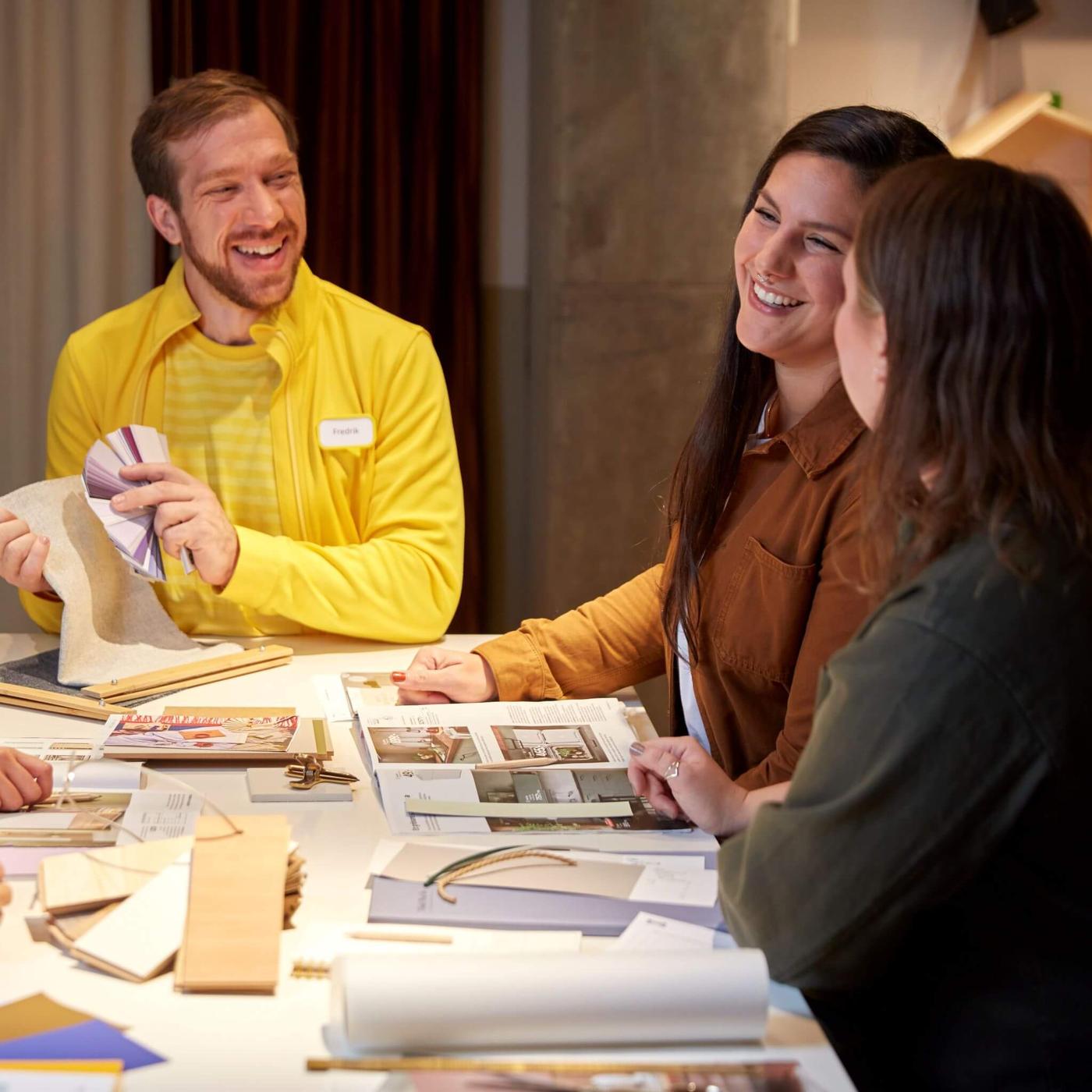 Image of an IKEA co-working helping customers design their space in a workshop