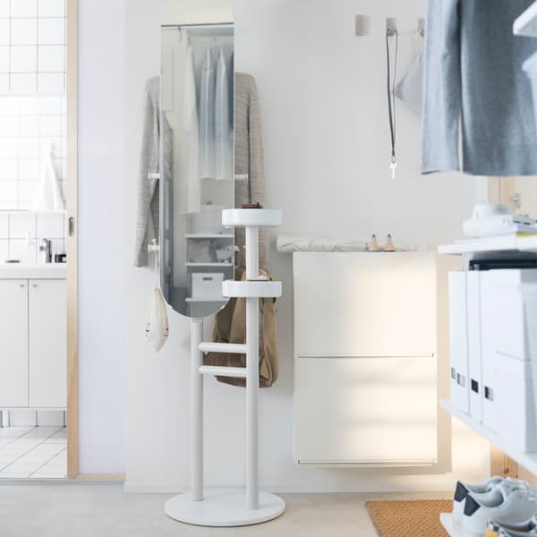In a hurry? Add the finishing touches in front of a smart valet stand such as IKEA LIERSKOGEN white valet stand with mirror!