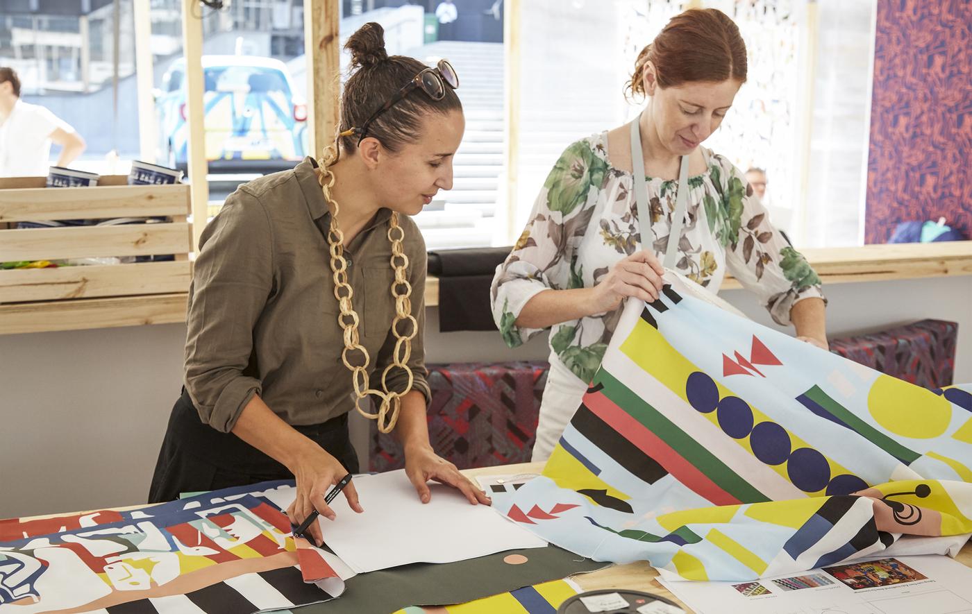Johanna Jelinek and Renée Rossouw work on textile ideas.