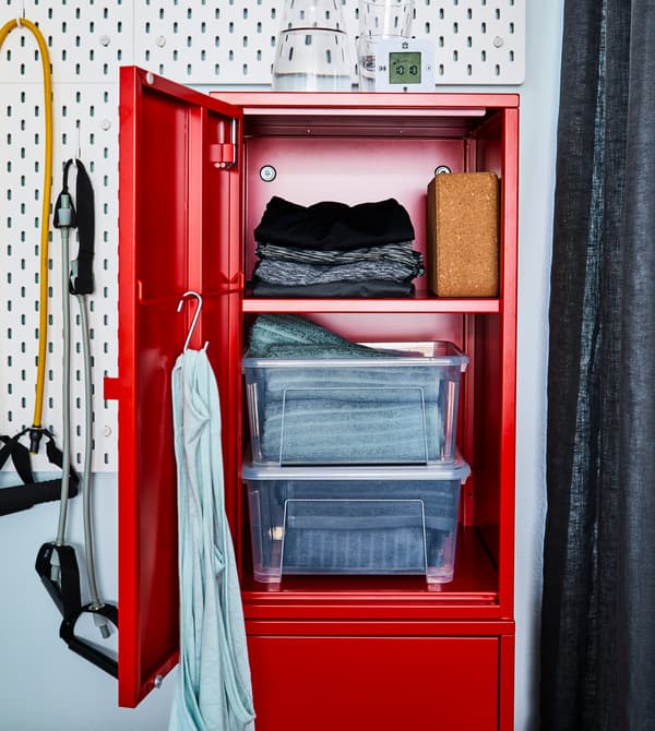 Keep your home workout gear stashed away and tidy in a cabinet.