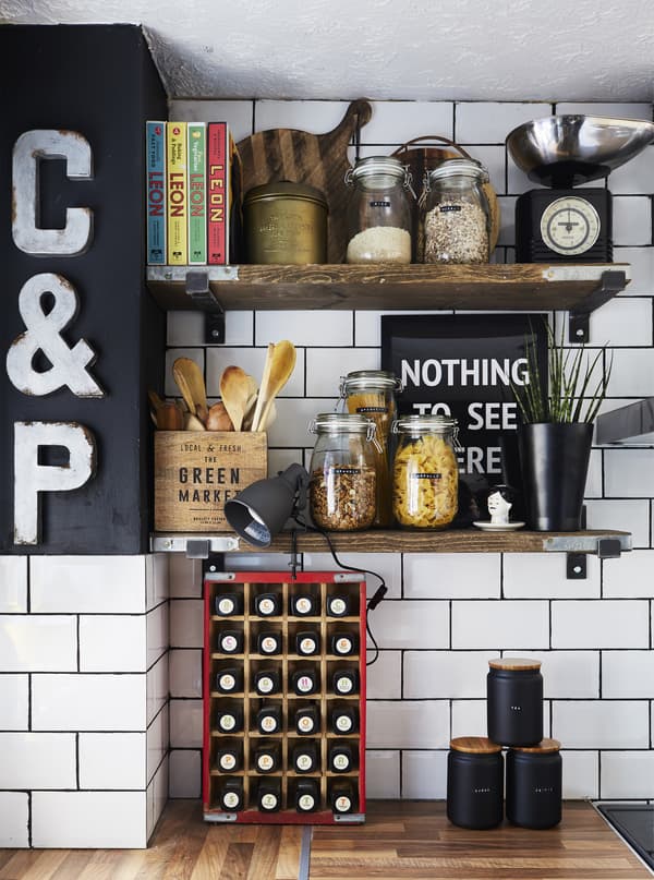 Kitchen shelves and white tiles.