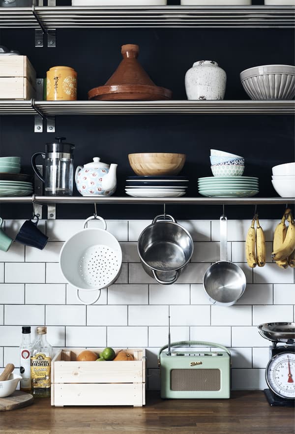 Kitchenware displayed on shelves.