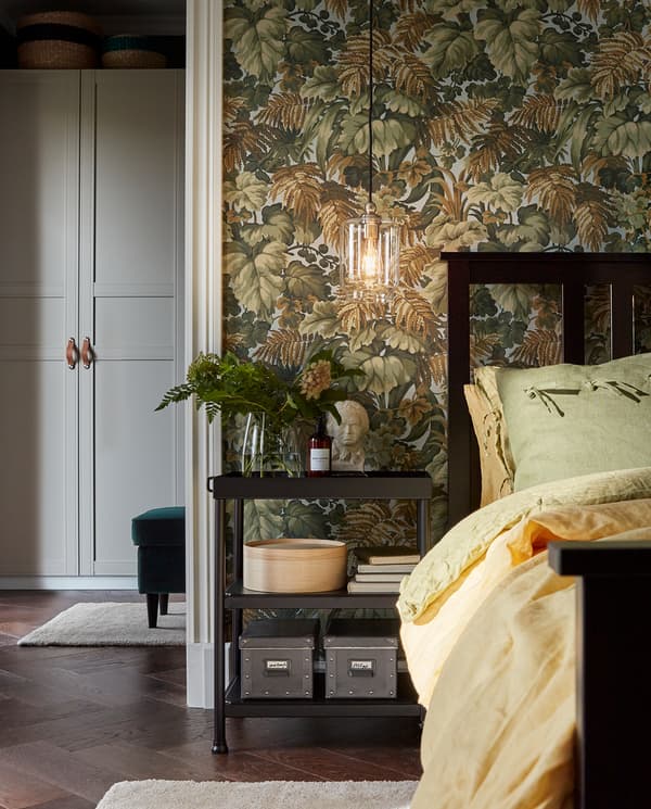 KORNSJÖ side table stands next to a bed and it’s used as a bedside table. Decorative items, books and boxes are stored here.