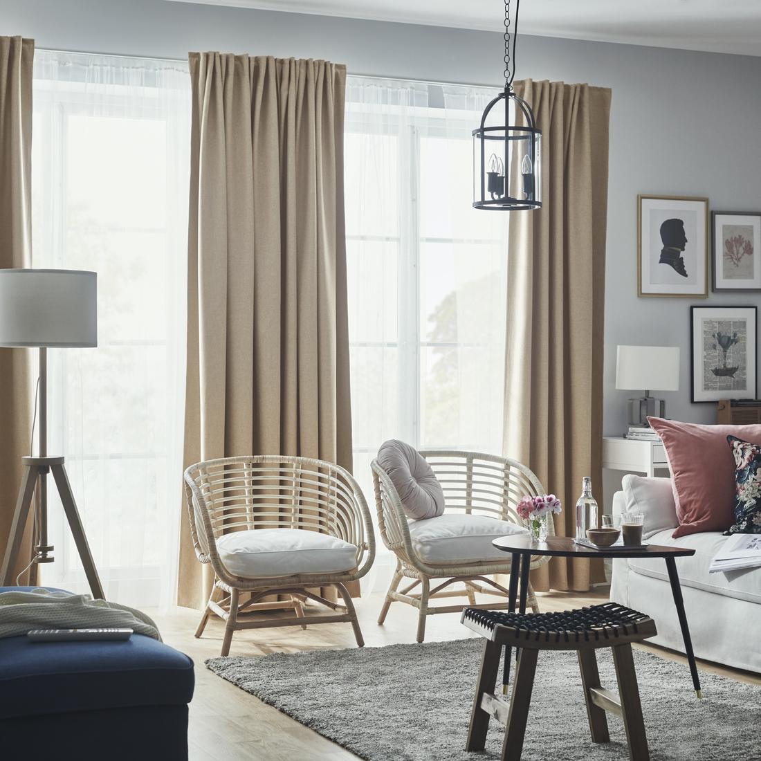 Living room setting with beige ANNAKAJSA room darkening curtains.