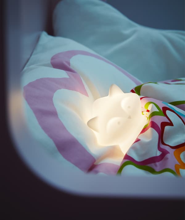 Looking for kids’ night lights? IKEA has a few like LURIGA raccoon night light in white. It uses LED, is tamper-proof and safety tested, so it can snuggle into bed with a child and help scare off any monsters.