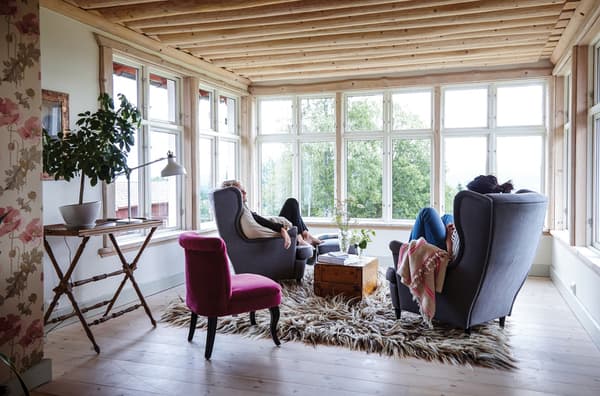 Make a cosy upstairs sanctuary with a few chairs, a rug and some throws.