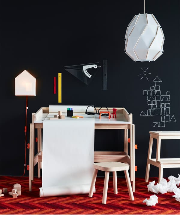 Make a creative work spot for the kids! Try IKEA FLISAT children’s desk in wood with a built in drawing paper roll holder!
