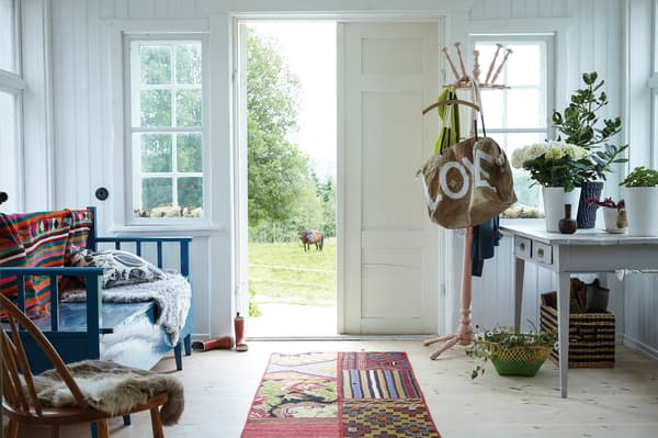 Make a feature of worn, vintage items inside with plants.