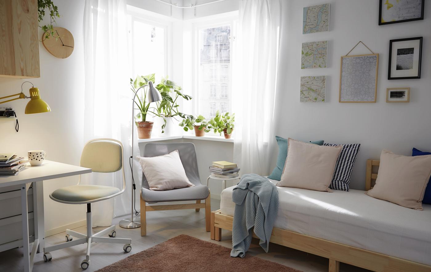 Make the very most of a small space by using pieces that can convert from bedroom to living room to dining space, to home office.
