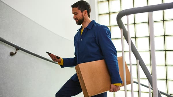 man walking up stairs