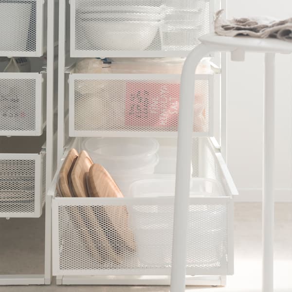 Maximise storage space. Put two drawer units such as IKEA LENNART under the table for storing tableware and groceries!