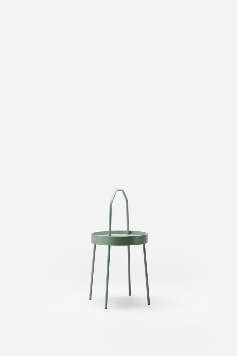 Mesa lateral de la serie BURVIK de color verde musgo.