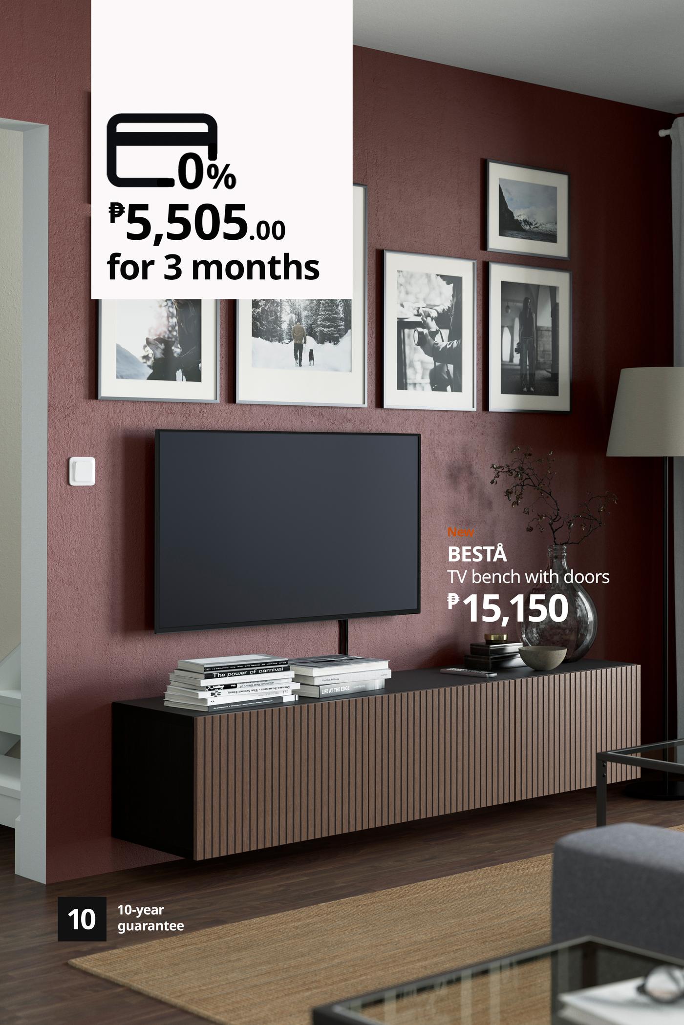 Modern living room featuring a large TV on a wood-slat cabinet; an IKEA BESTÅ ad highlights a 10-year guarantee and three-month financing.