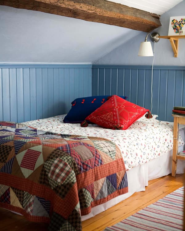 Patchwork quilts give a cosy country look.
