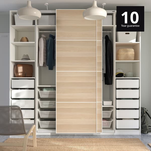 PAX wardrobe in white stained oak with MEHAMN sliding door and drawers inside. 