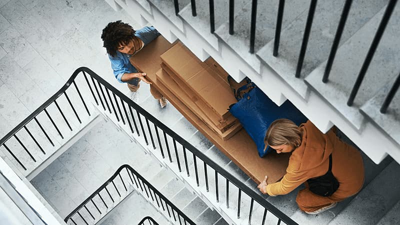 people carrying furniture