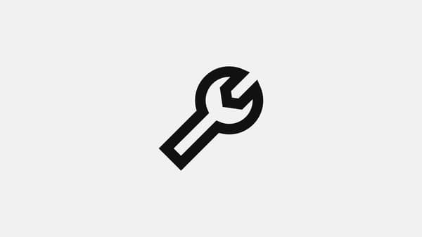 Pictogram of a man and a wrench.