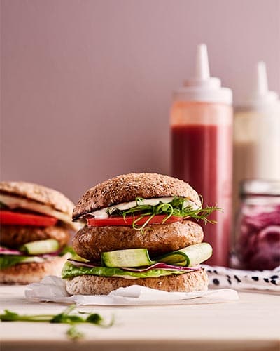 Plant-based burgers served with sides of your choice
