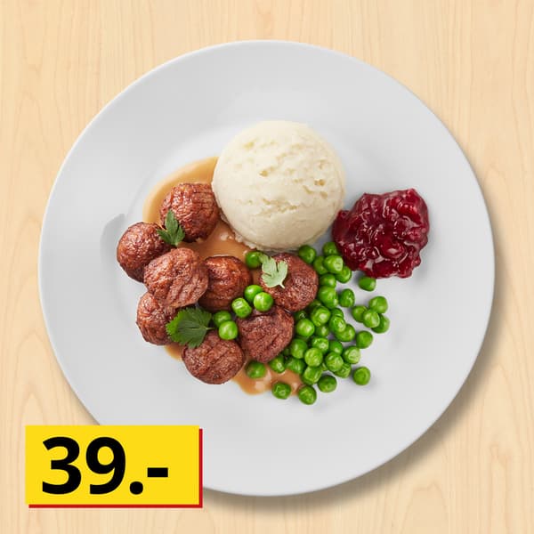 Plantebaserede boller 8 stk. serveret med kartoffelmos, ærter, flødesauce og tyttebærsyltetøj.