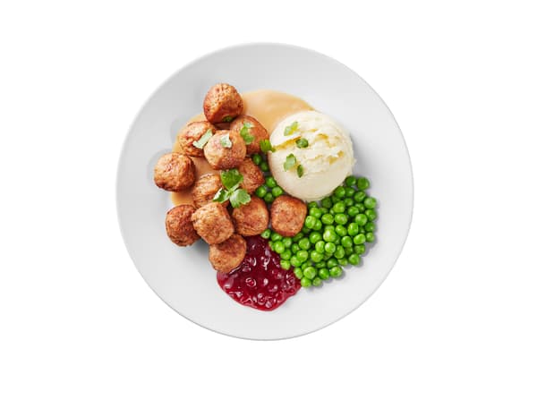 Plate with 12 meatballs, peas, lingonberry sauce, mash and gravy