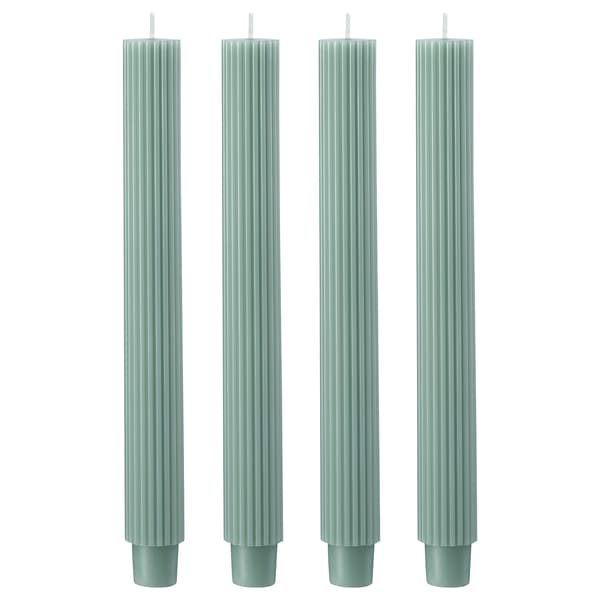 Product image of four textured, lieght green-coloured taper candles.