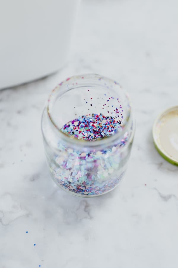Purple and blue glitter in a pot