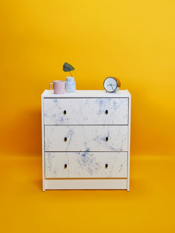 RAST chest of drawers painted with marble pattern. 