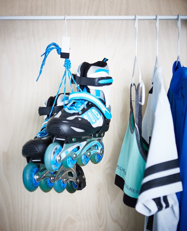 Rollerblades hanging with a clothes clip.