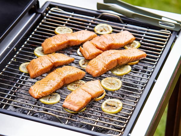 Salmon grilling on a barbeque.