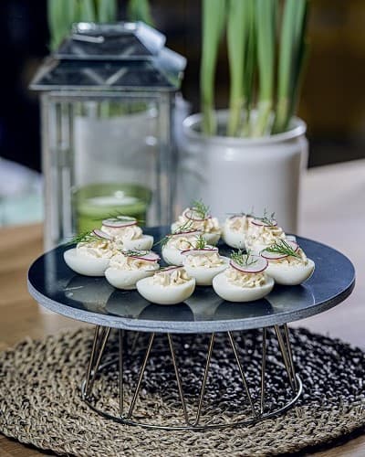 Scandinavian devilled eggs on a cake stand