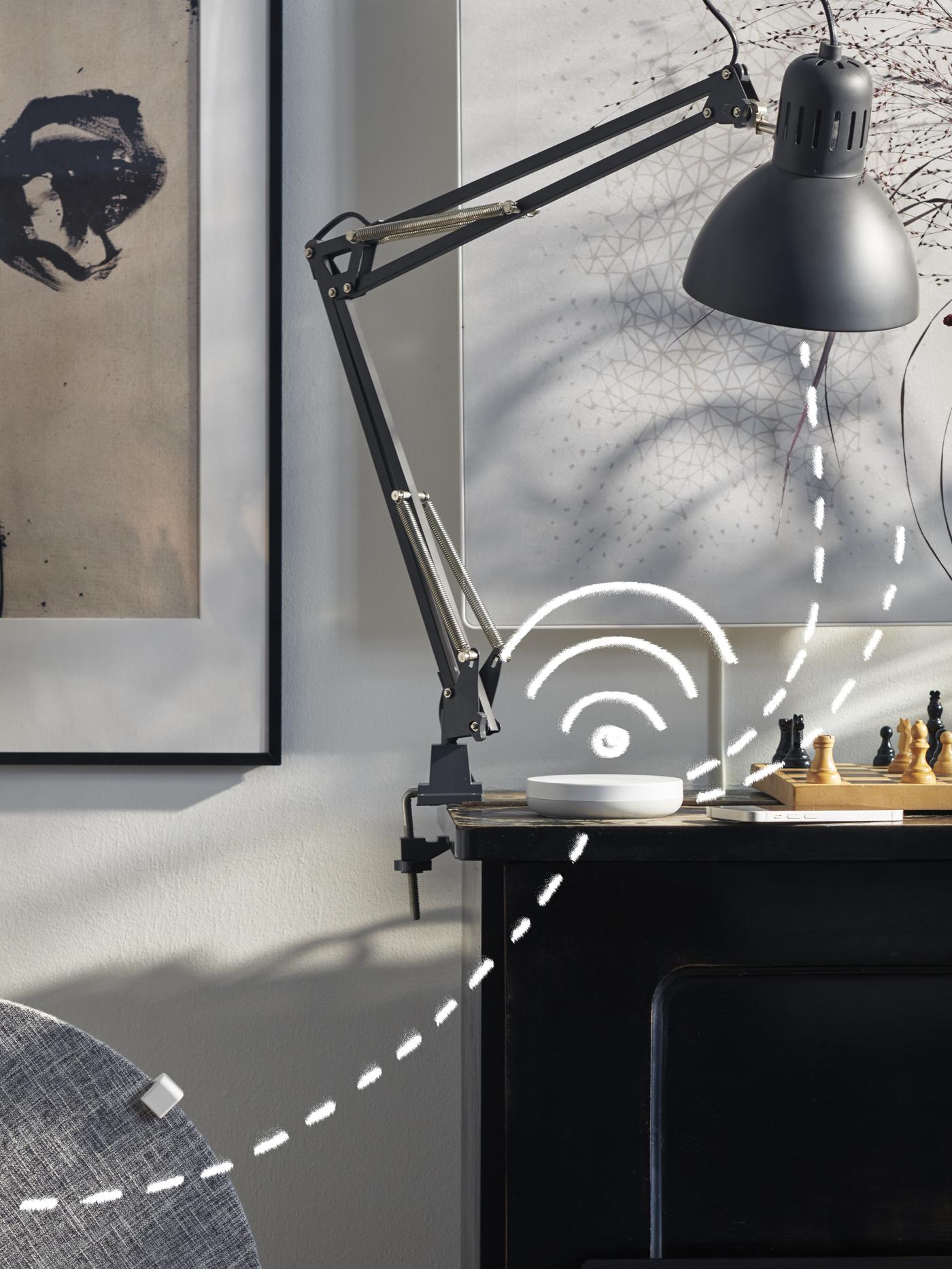 Smart deak lamp on a black deak